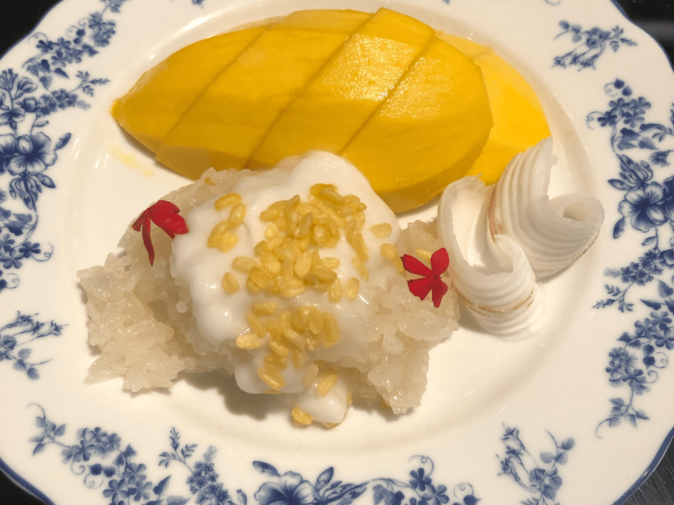 Traditional Thai dessert of sticky rice with fresh mango and coconut sauce.