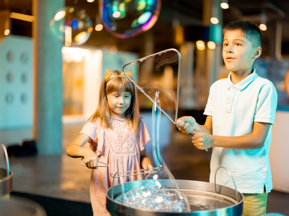 Children engaging with interactive exhibits at Bangkok Science Museum