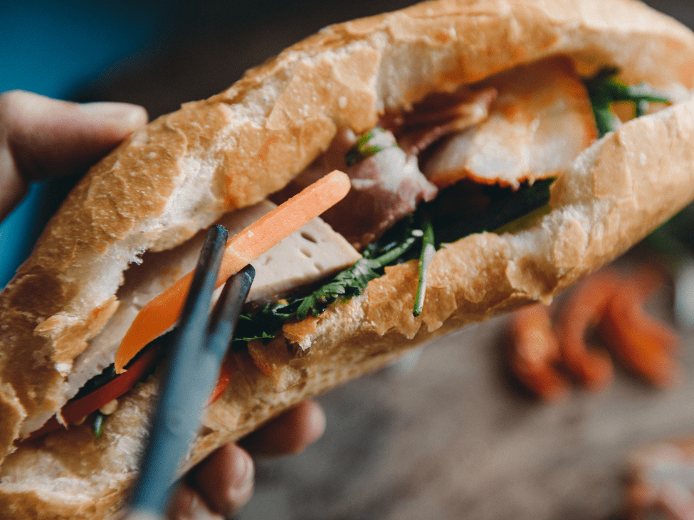 Banh Mi being made at a night market stall.