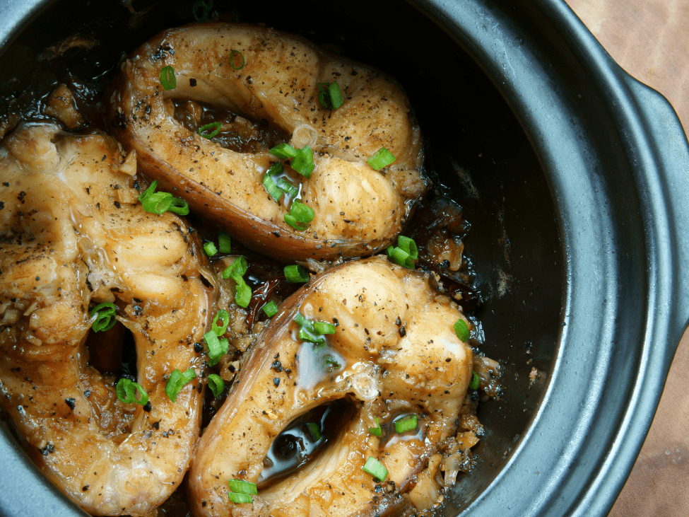 A clay pot of caramelized and braised fish