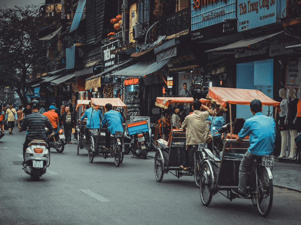 Traditional Vietnamese cyclo ride in the city.