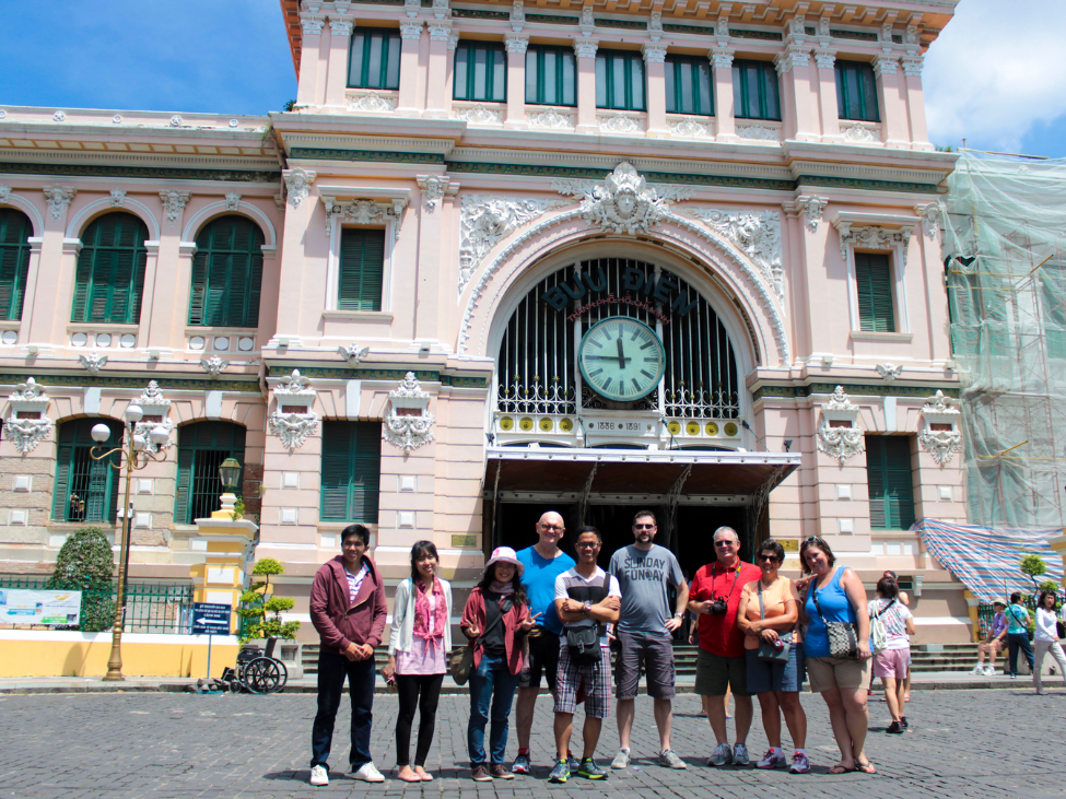 Tourists communicating with local Vietnamese