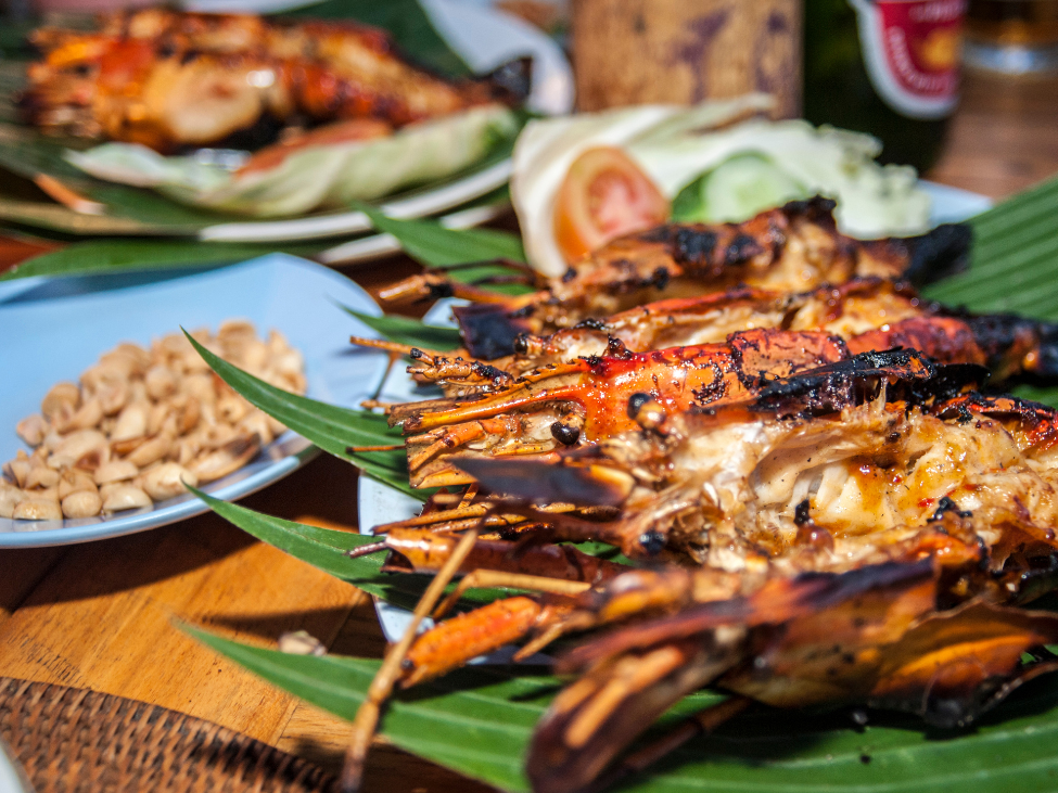 Grilled lobster on a plate.