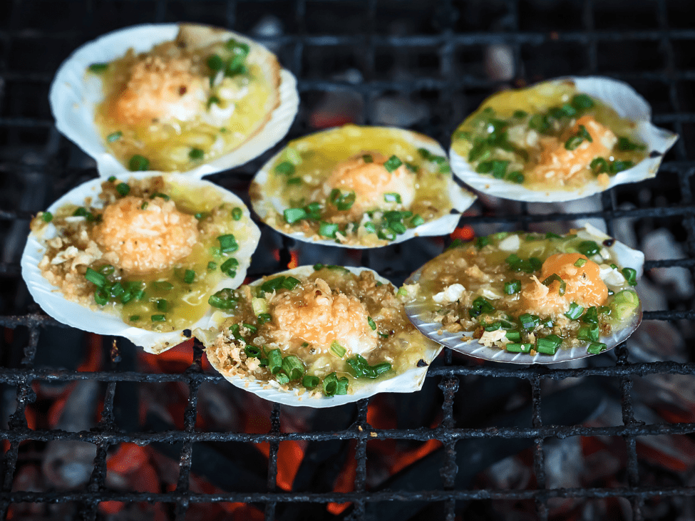 Grilled scallops with green onions.