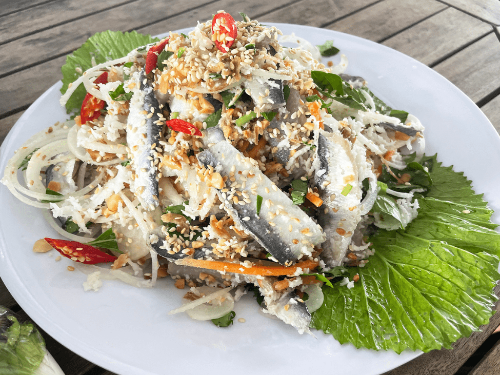 Goi Ca Trich (Vietnamese Herring Salad) served with fresh herbs in Phu Quoc, Vietnam