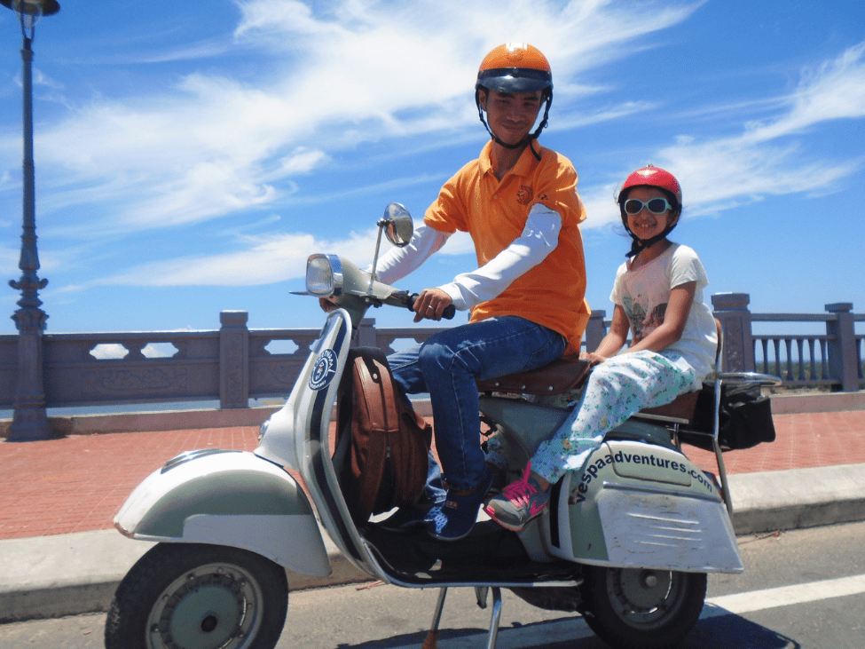 Kids wearing breathable clothing and helmets, ready for a bike ride.