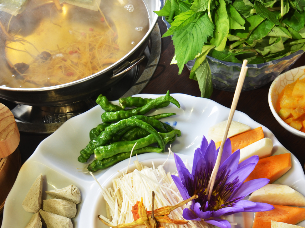 Vegetarian hot pot with assorted vegetables and tofu in Vietnam