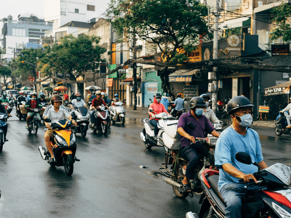 Tourist riding a rented motorbike in Vietnam.