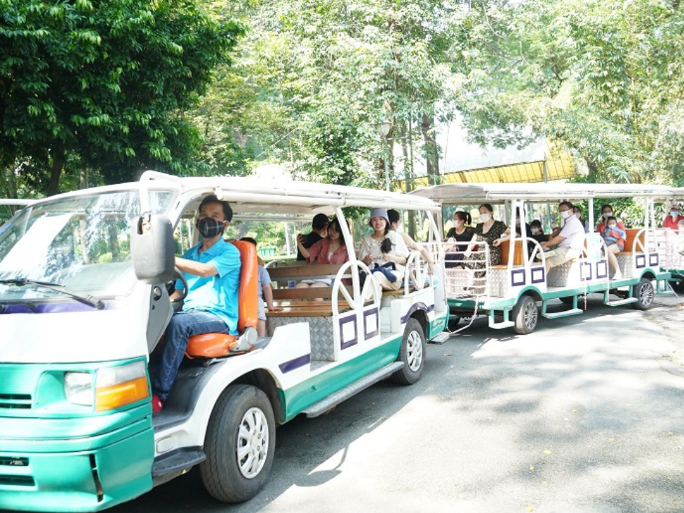 Children on the mini train ride at Saigon Zoo and Botanical Garden