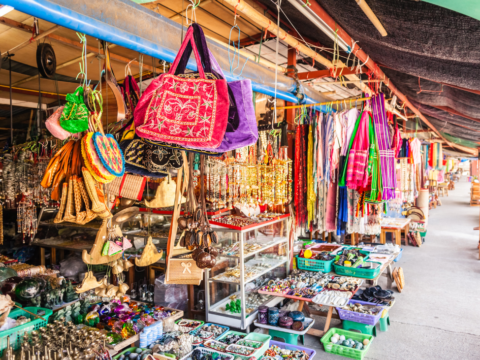 Children exploring a vibrant Thai market