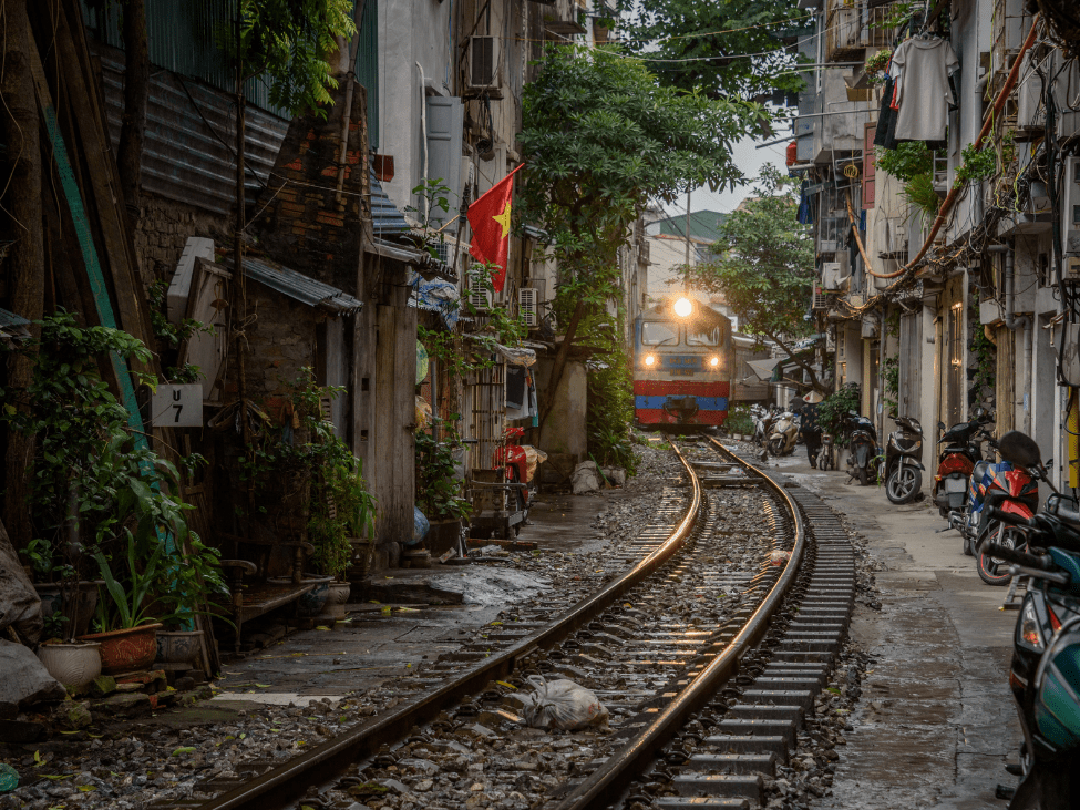 Vietnamese train on a street.