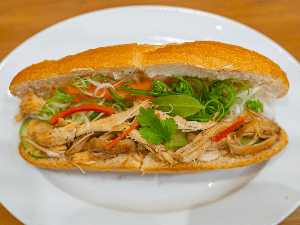 Best Banh Mi in Da Nang filled with pork, pate, and vegetables.