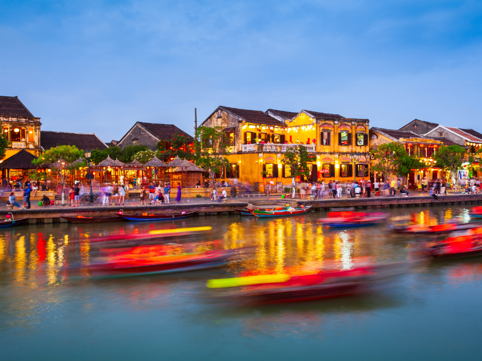 Vibrant Hoi An market with colorful displays of fresh produce and local delicacies.