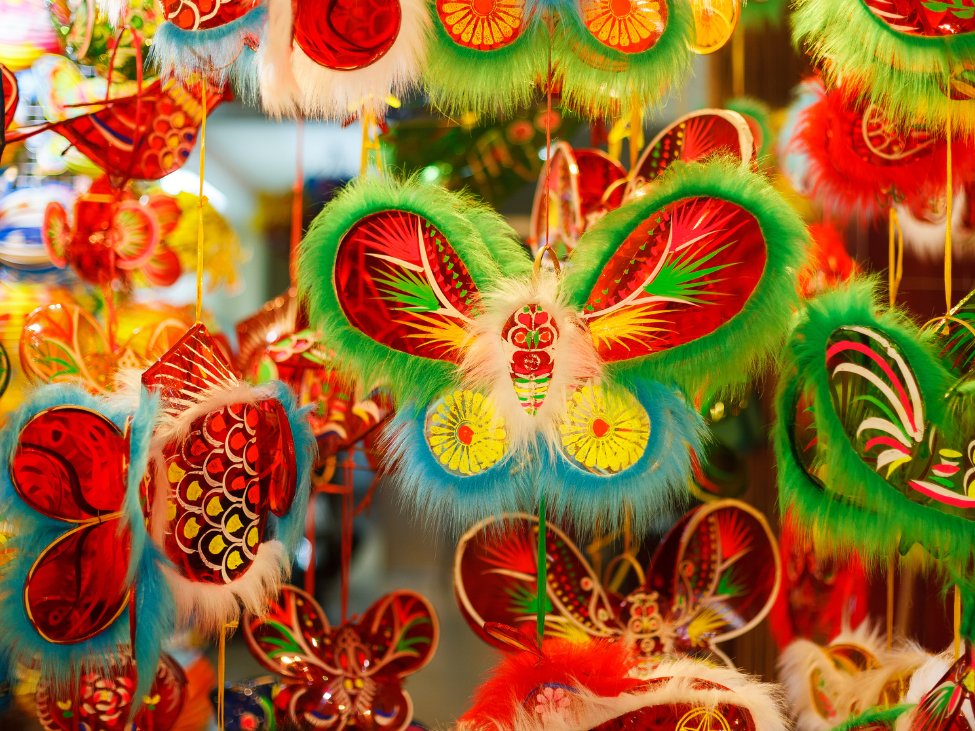 Children holding lanterns during Mid-Autumn Festival in Vietnam.