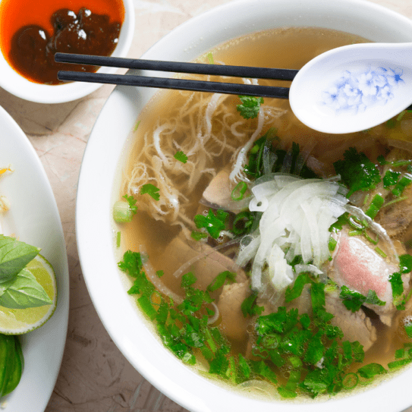 A steaming bowl of pho with a perfect blend of spices at Pho Lan Ong in Hanoi.