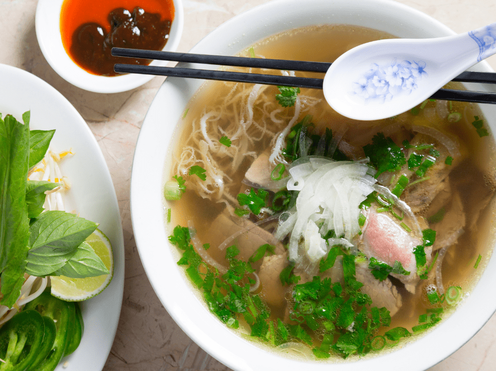 A steaming bowl of pho with a perfect blend of spices at Pho Lan Ong in Hanoi.