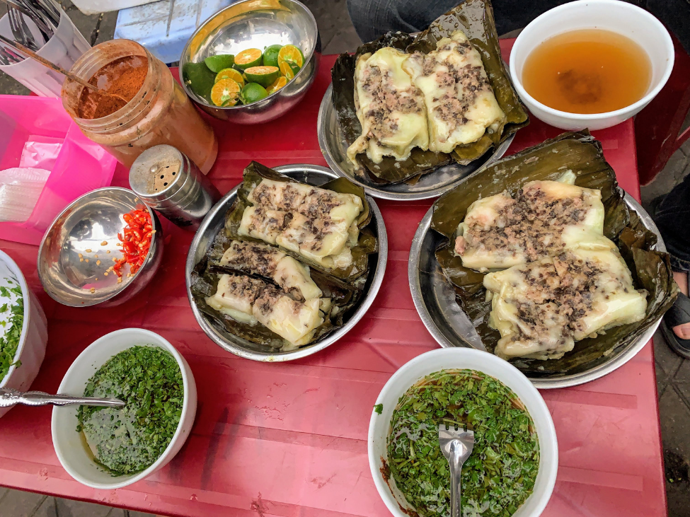 Street food tour in Hanoi with a variety of local dishes