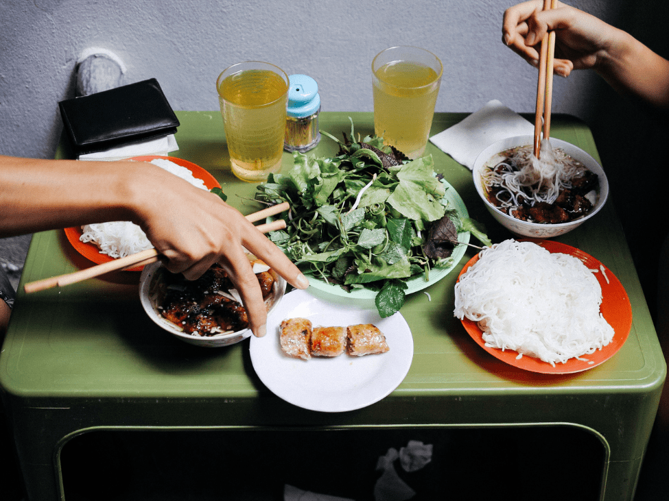 Street food tour in Hanoi with a variety of local dishes