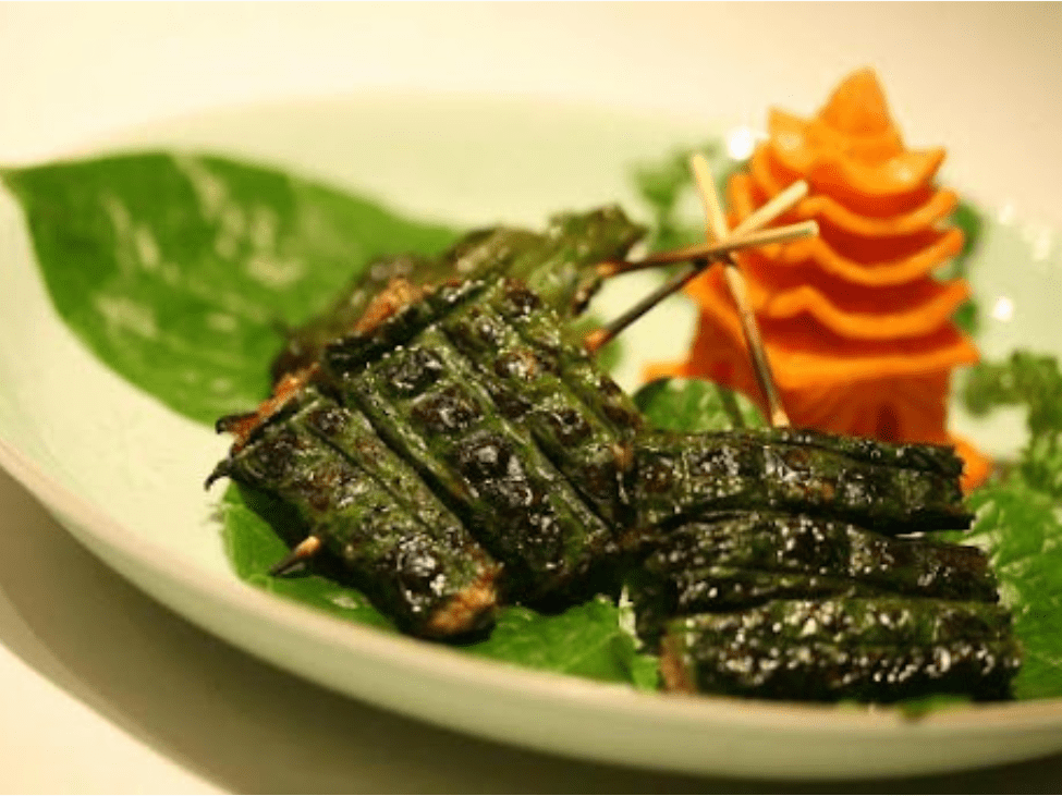 Thit Bo La Lot beef rolls wrapped in betel leaves.