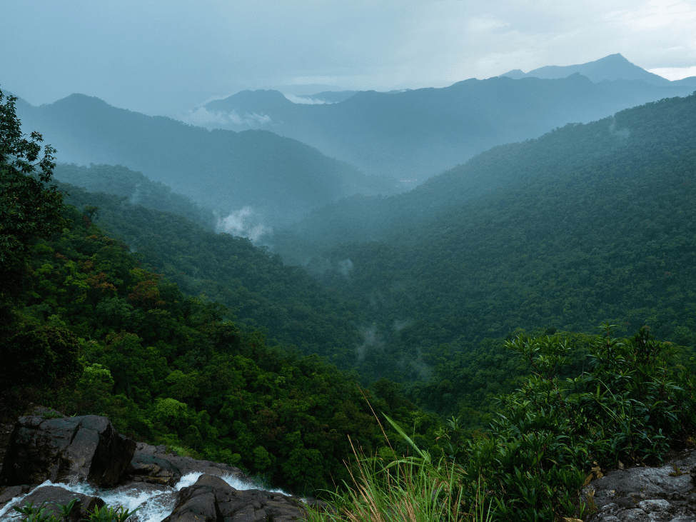 Mist-covered mountain ranges at Bach Ma National Park.