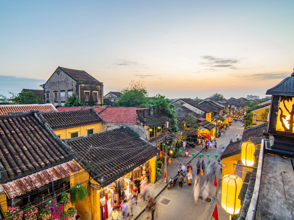 Hoi An’s lantern-lit streets with preserved merchant houses and traditional architecture.