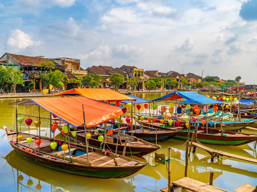 Thousands of floating lanterns reflecting on the serene river in Hoi An.