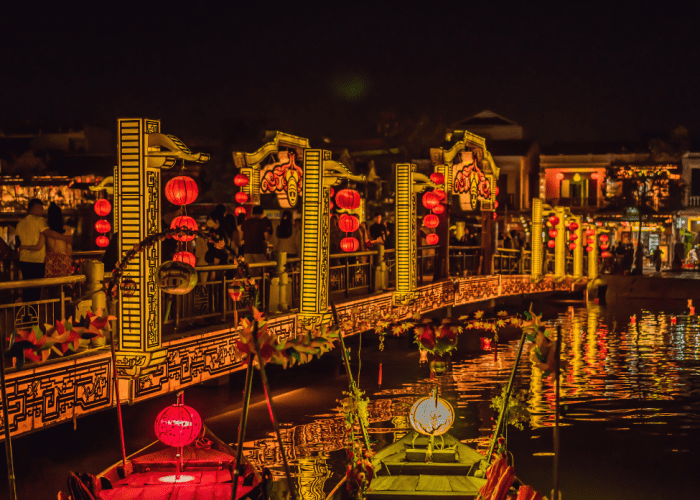 A stunning view of Hoi An night lanterns glowing brightly in the dark.