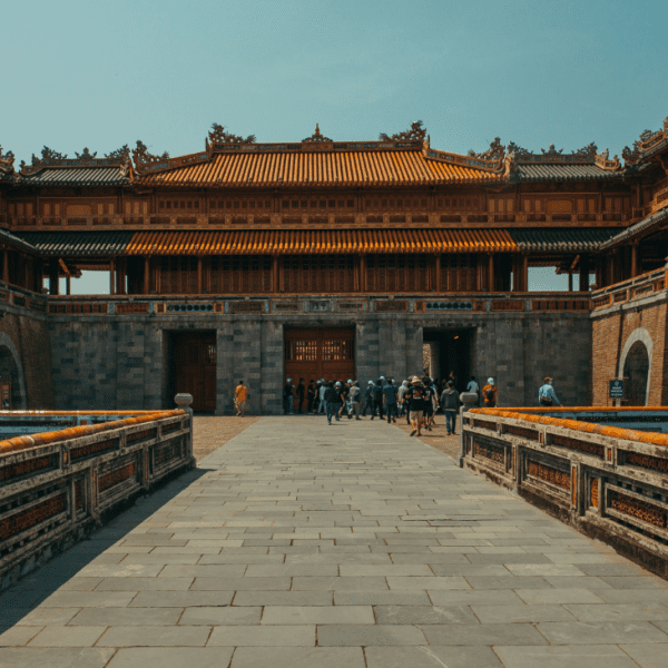 Ornate temples and walls of Hue Imperial City surrounded by tranquil gardens.