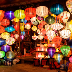 Photo of vibrant lanterns illuminating the streets during the lantern festival in Hoi An.