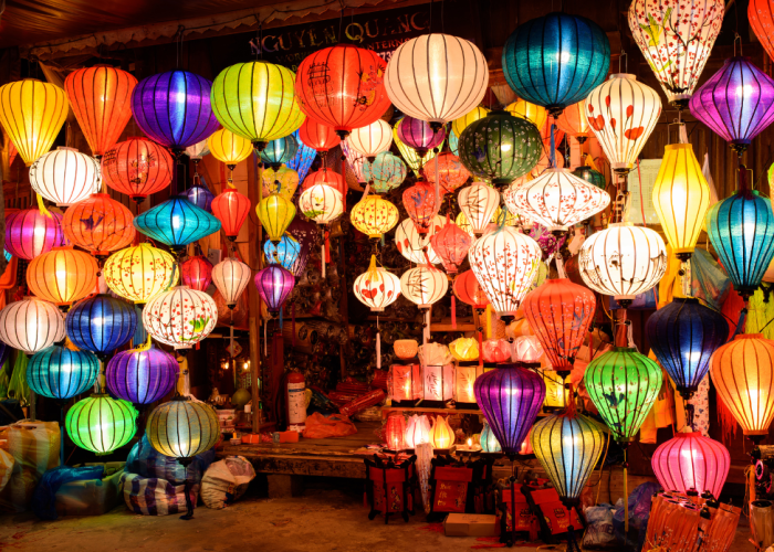 Photo of vibrant lanterns illuminating the streets during the lantern festival in Hoi An.