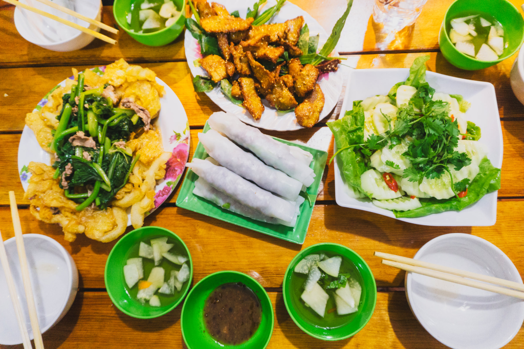 Phở Cuốn being served on a Vespa food tour through the streets of Hanoi.