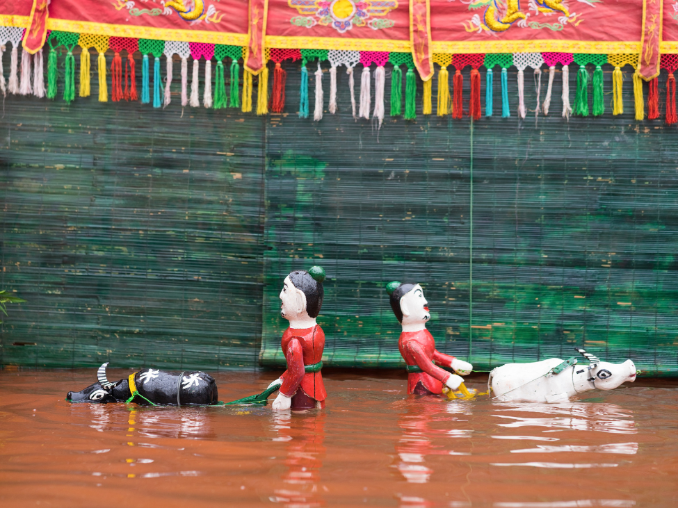 A scene from a water puppet show in Hanoi, showcasing the traditional Vietnamese folklore.