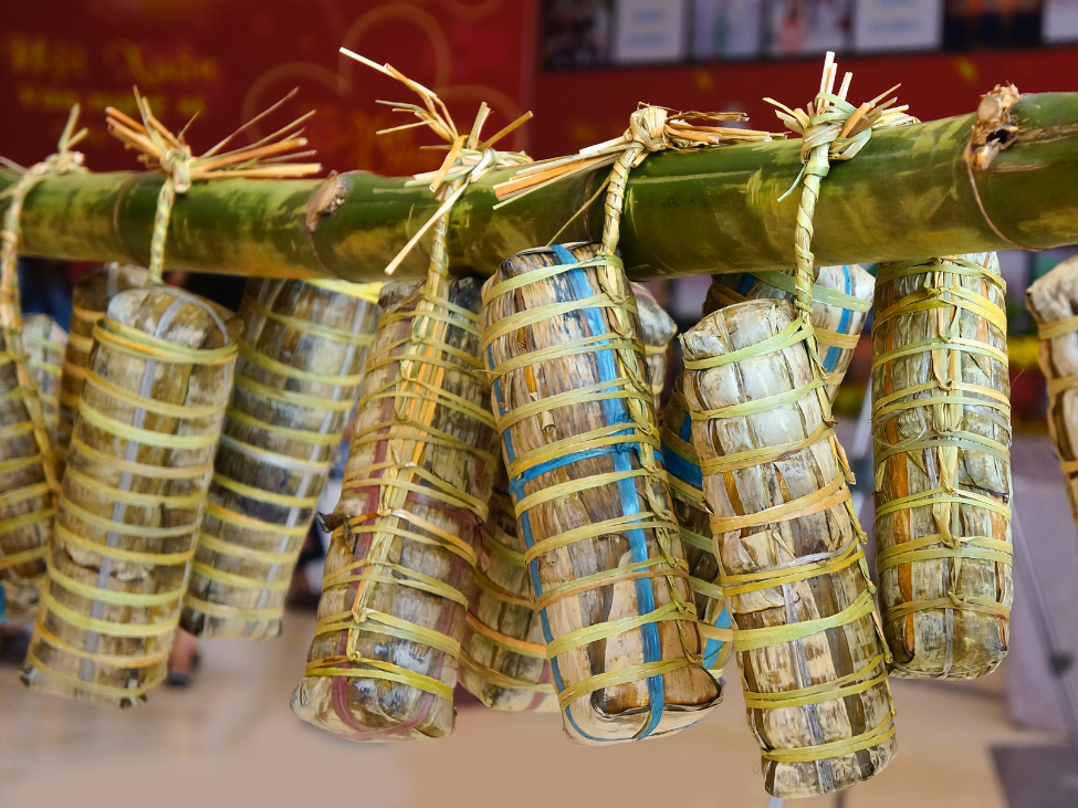 Banh tet cut into slices, showing its colorful layers of rice and fillings