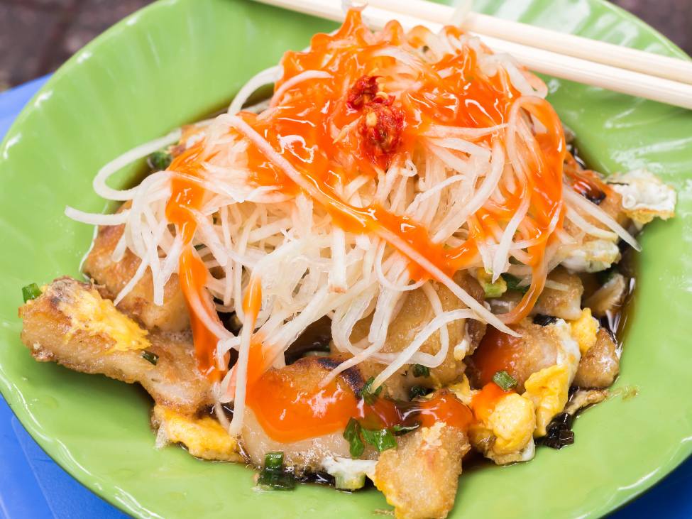 Crispy Vietnamese fried rice flour cakes topped with egg and green onions.