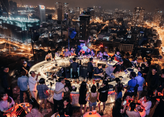 Guests enjoying cocktails with a view at Chill Skybar in Ho Chi Minh City.