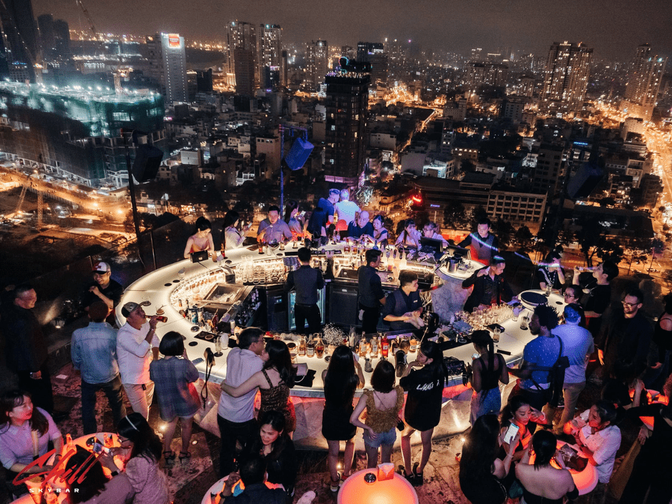 Guests enjoying cocktails with a view at Chill Skybar in Ho Chi Minh City.