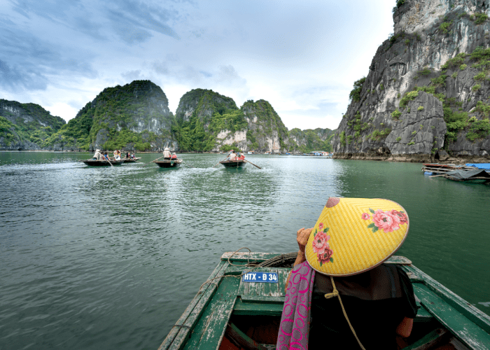 Halong Bay’s limestone karsts under clear January skies.