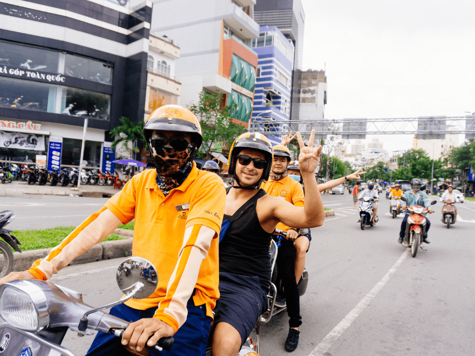 A family on a Vespa tour exploring Vietnam.