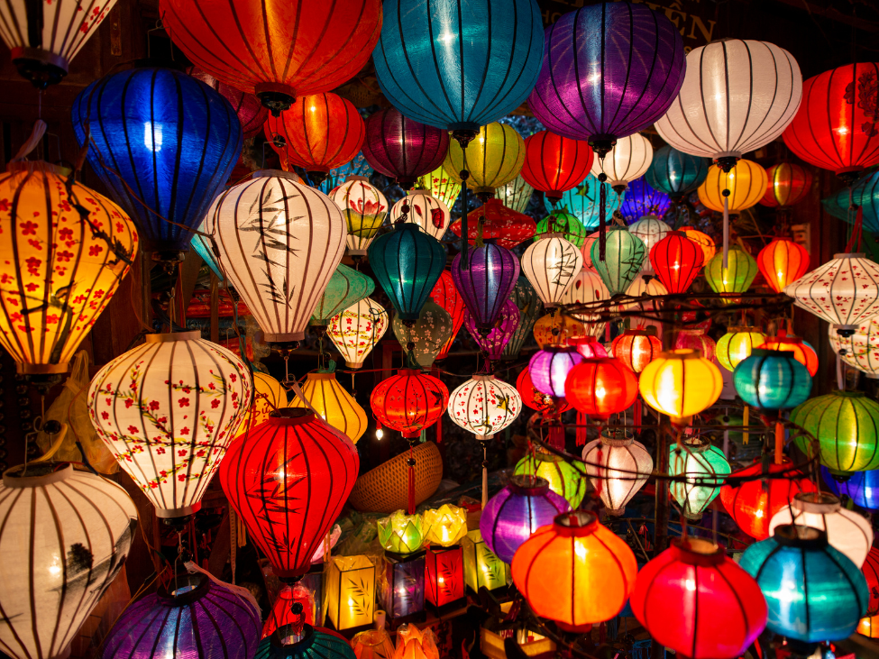 A family making traditional Vietnamese lanterns in Hoi An.