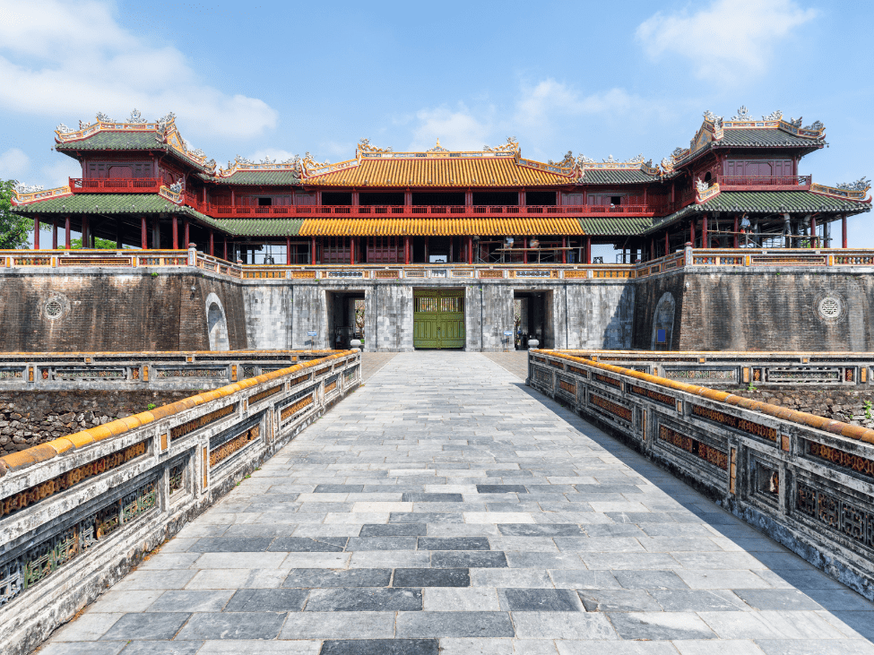 The historic Imperial City surrounded by serene gardens in Hue.