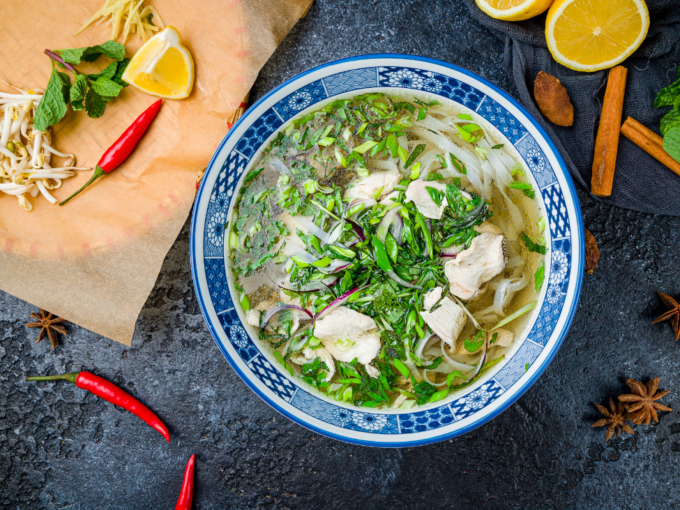 Pho Hoa Hung’s clear broth pho with thinly sliced beef and herbs.