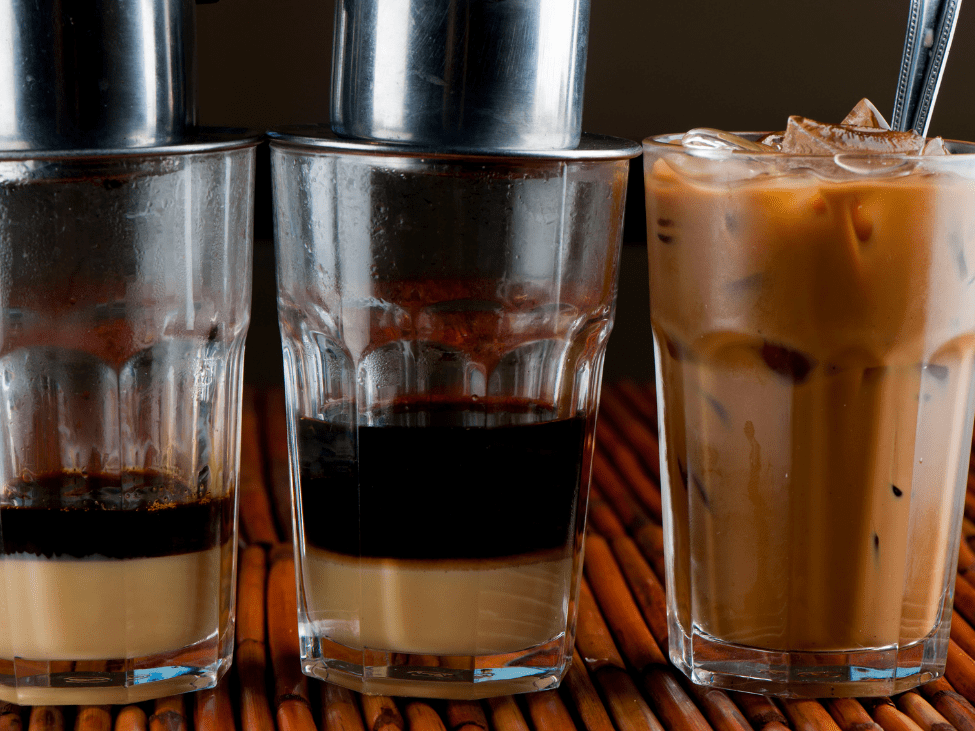 Traditional Ca Phe Sua Da on a wooden table.