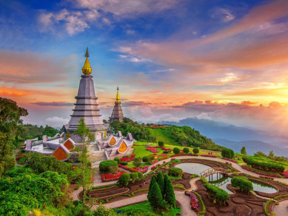 Majestic waterfall surrounded by lush greenery at Doi Inthanon National Park.