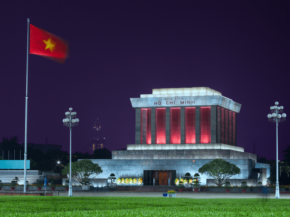 A panoramic view of the Ho Chi Minh Mausoleum with lush gardens.