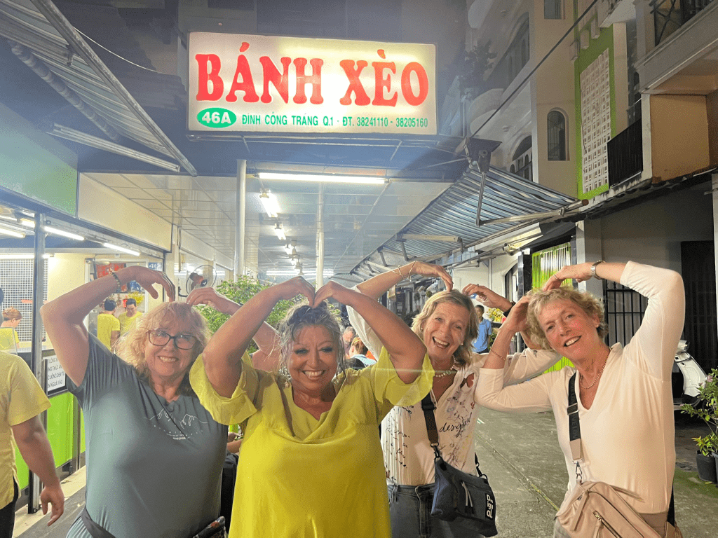 Vespa riders enjoying a culinary tour in Ho Chi Minh City