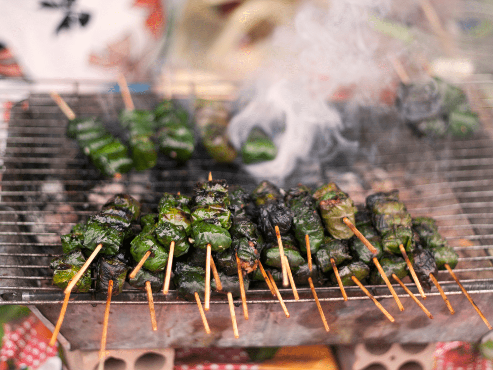 Bo La Lot grilled beef wrapped in betel leaves.