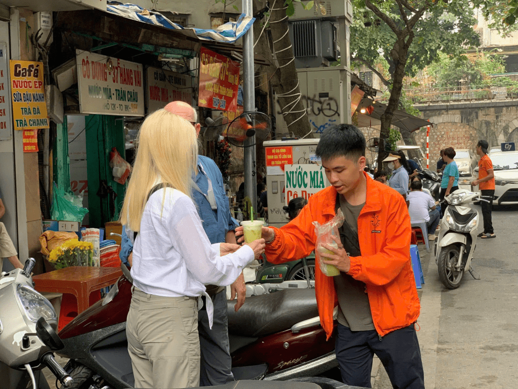 A refreshing glass of sugarcane juice served at Dong Xuan Market.