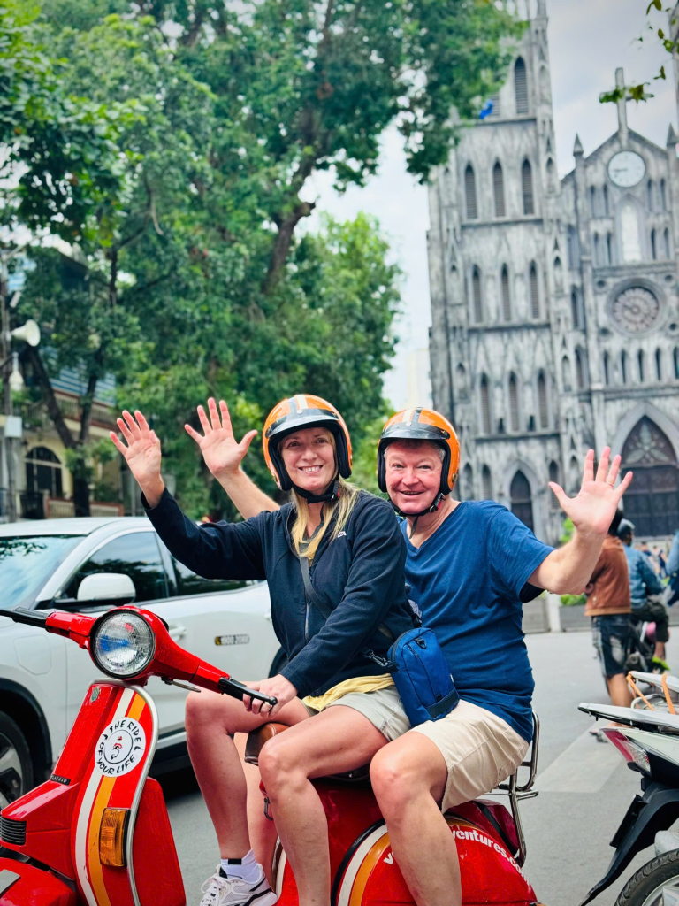 A vintage Vespa parked in front of St Joseph’s Cathedral during the Hanoi Photo Tour.