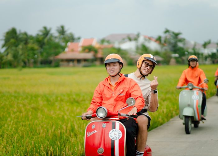 A Vespa adventure through the rice fields of rural Vietnam.